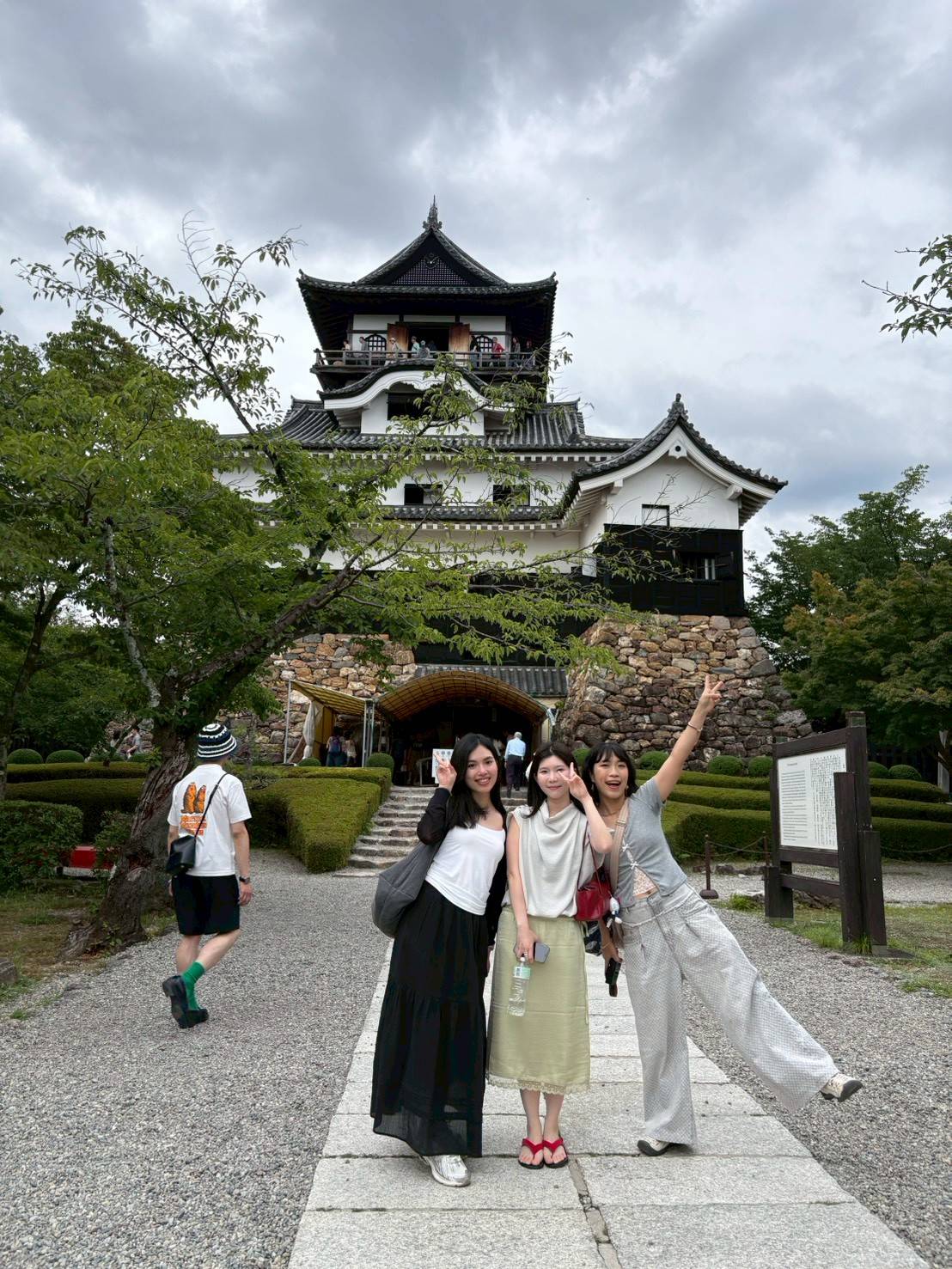 Three guests in front of Inuyama Castle in Aichi